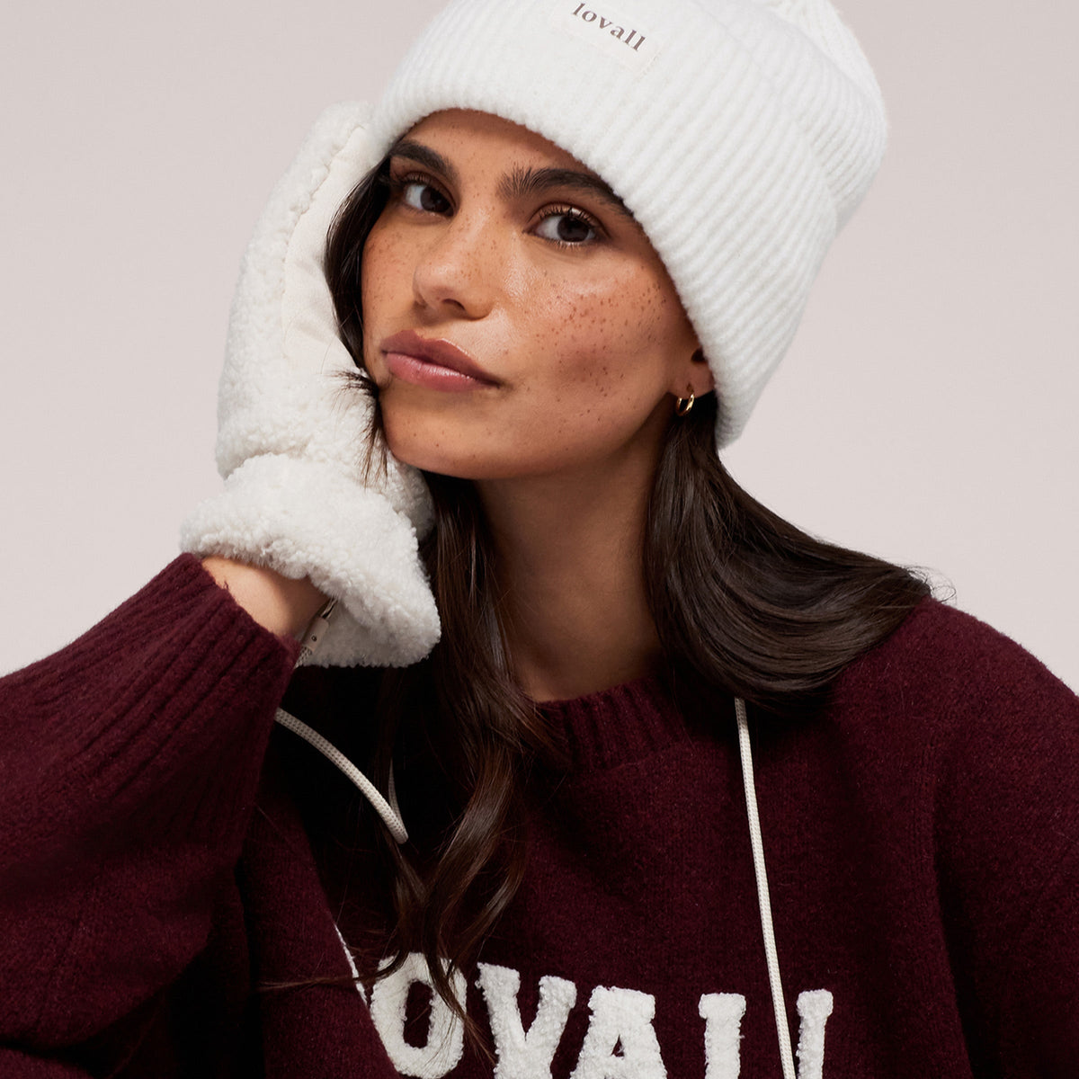 The Knit Beanie in Ecru, close-up view