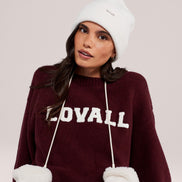 The Knit Beanie in Ecru, front view