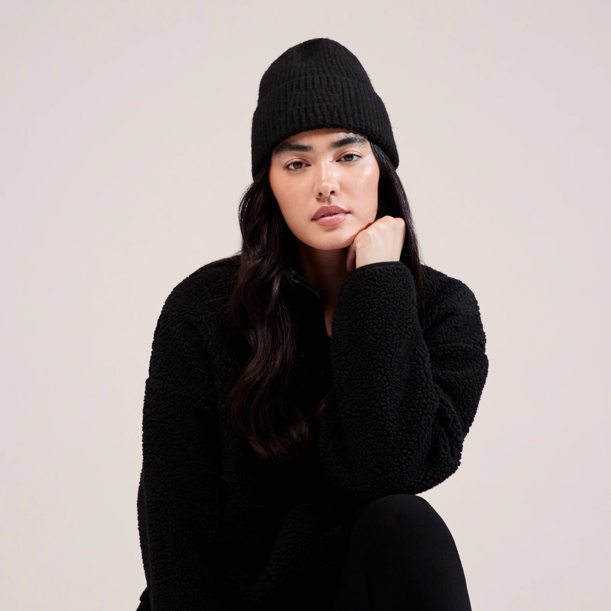 The Knit Beanie in Black — portrait-assis